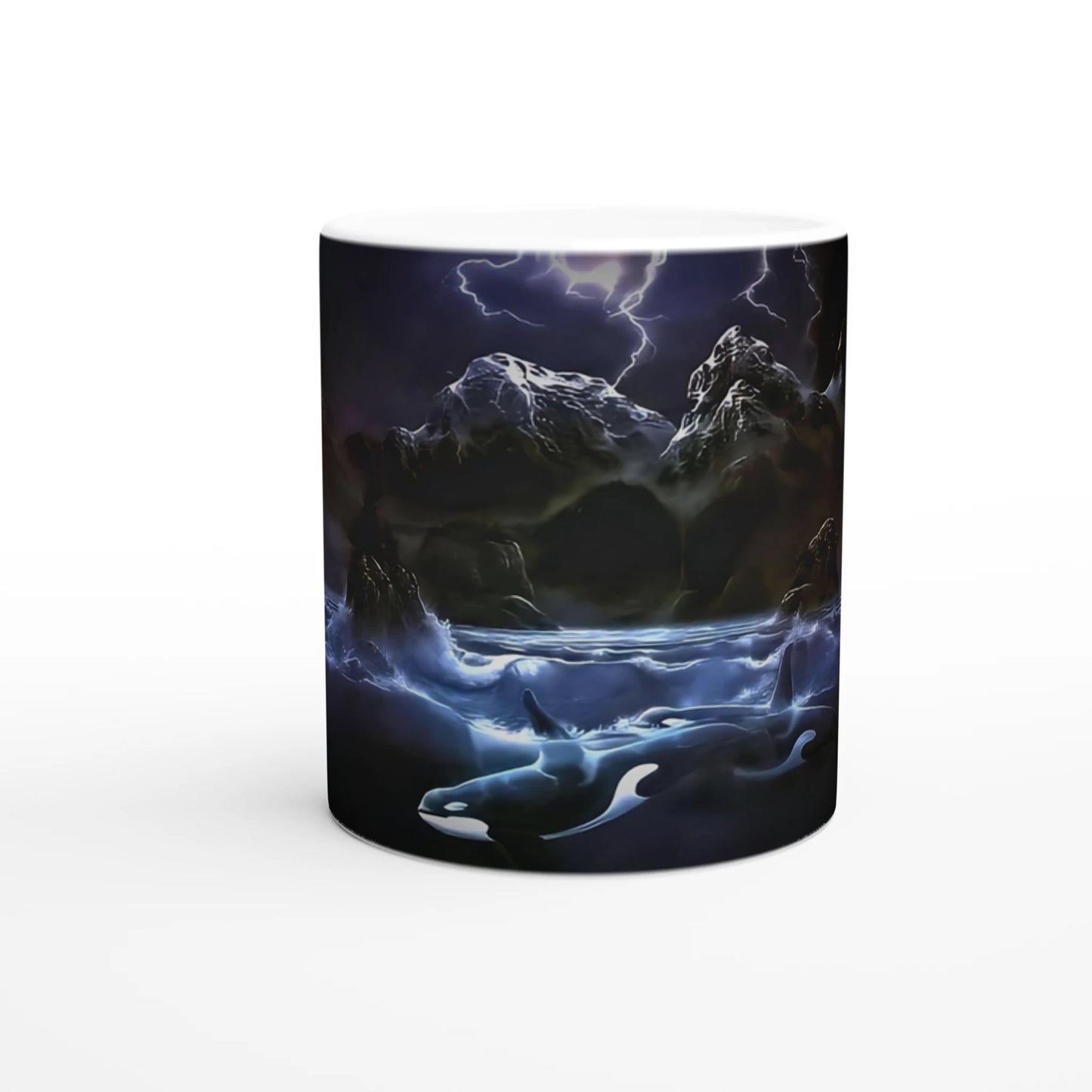 The "Midnight Orcas" mug by Ken Skoda Studio is ideal for those who love the ocean. This ceramic mug features a striking design of lightning flashing over tumultuous seas with orcas gracefully swimming below the waves. Dark, jagged mountains rise under a stormy sky, creating a captivating scene.